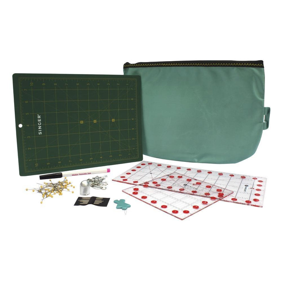 Kit de manualidades quilting y patchwork Singer, incluye: Tabla para corte de tela, Reglas de corte con medidas en pulgadas, seguros, Agujas, Dedal, Marcador para telas, ensartador de aguja manual