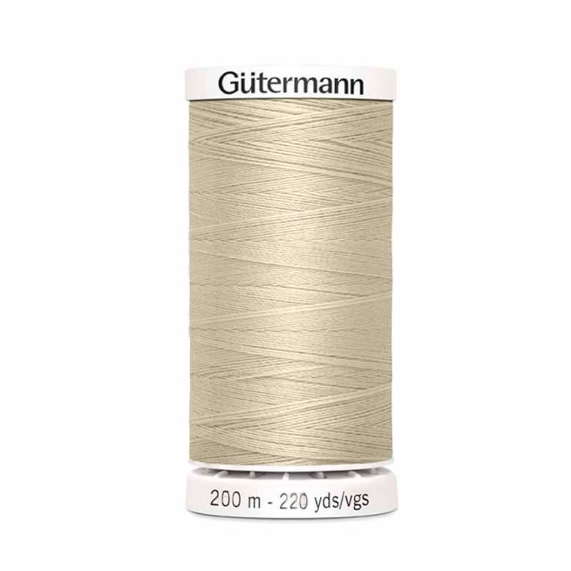 Hilo Gutermann Maralon, para Costura a Mano y Máquina de coser, Color Hueso, con 200 mts. Caja con 12 Carretes del mismo color