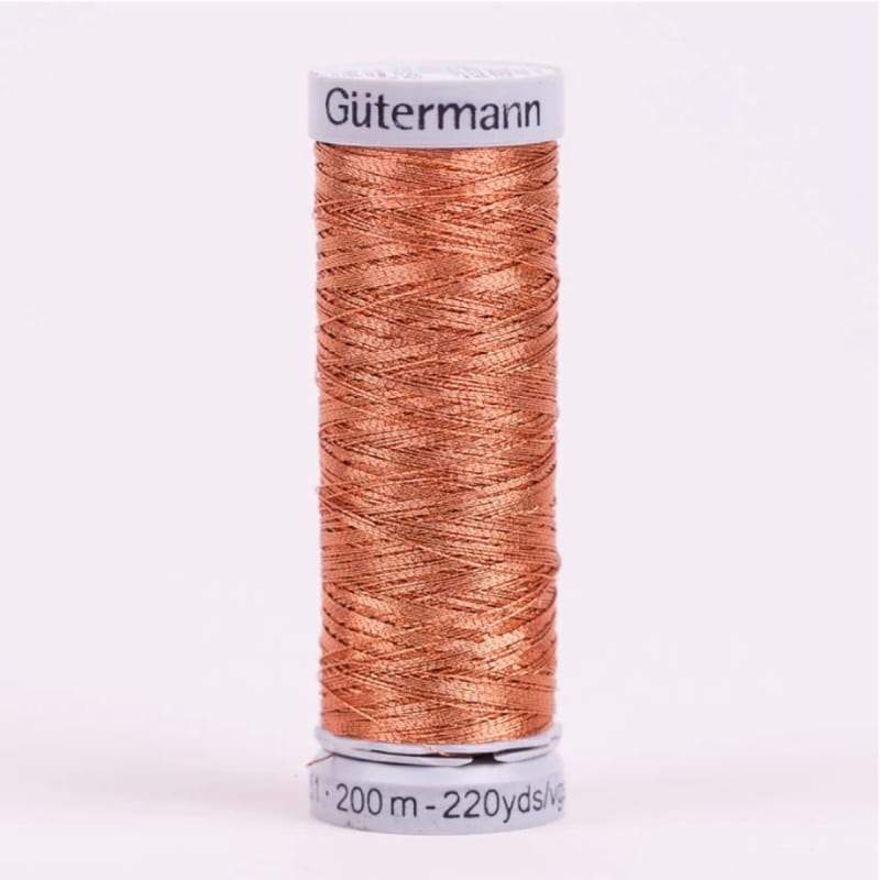 Hilo Gutermann Metalizado, para Máquina bordadora, Color Cobre, de 200 mts. Caja con 5 Carretes mismo color