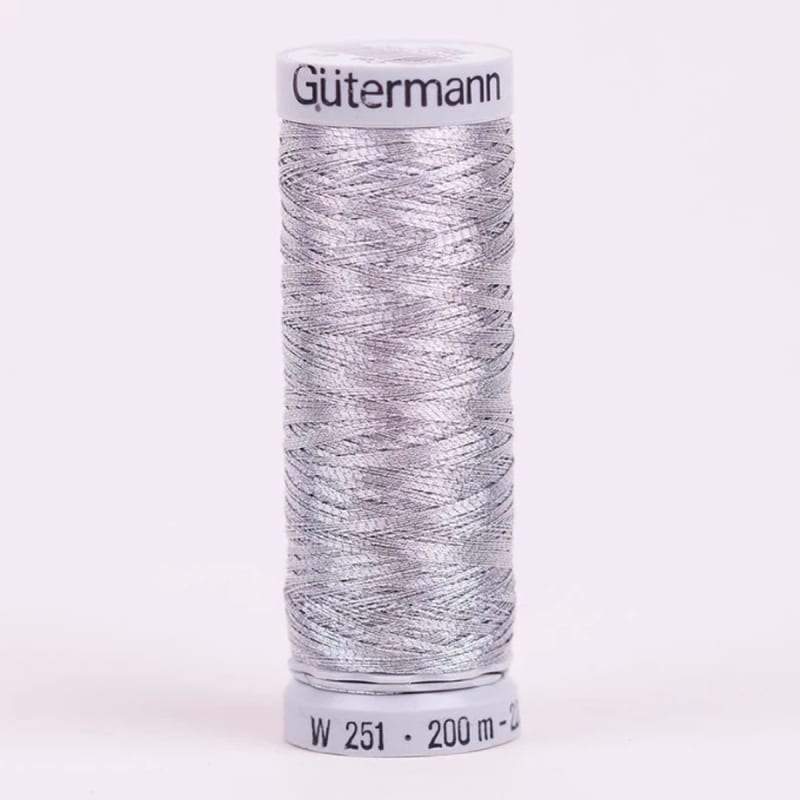 Hilo Gutermann Metalizado, para Máquina bordadora, Color Plata, de 200 mts. Caja con 5 Carretes mismo color